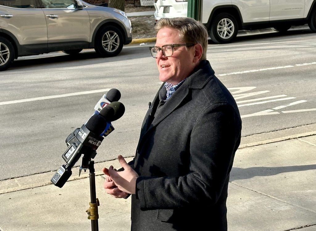 Minocqua Brewery owner and liberal activist Kirk Bangstad addresses reporters after filing a lawsuit in Dane County Circuit Court seeking to block former President Donald Trump from Wisconsin ballots in 2024. Anya van Wagtendonk/WPR