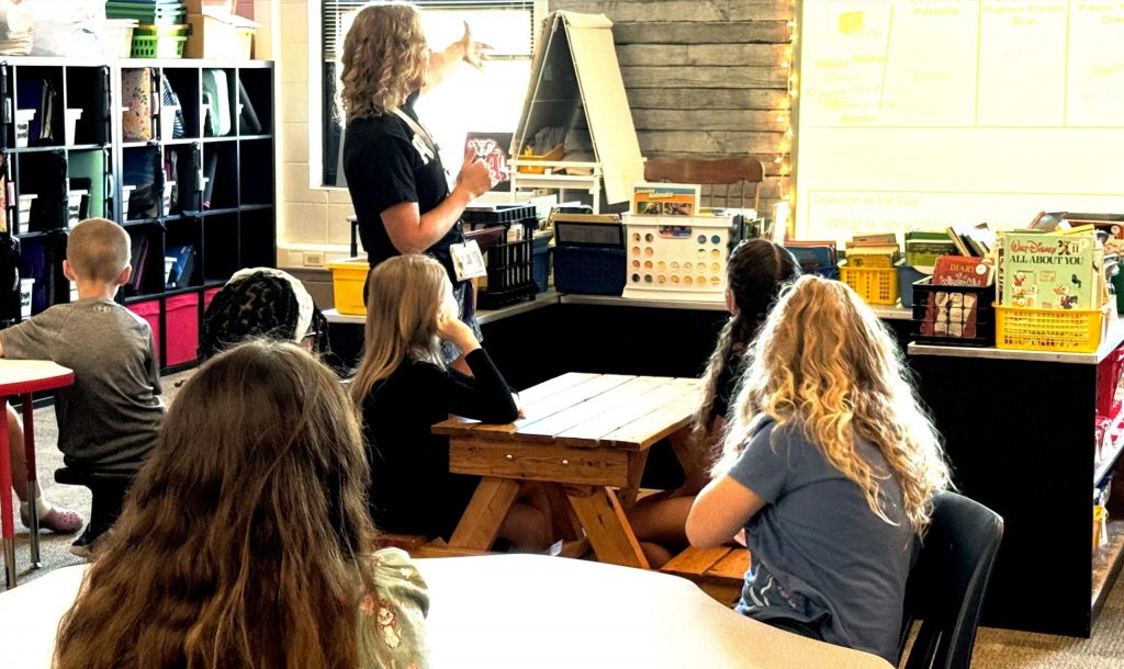 A teacher at Prairie Elementary School in Waukesha reviews classroom expectations with students during the first week of classes. Photo courtesy of the Waukesha School District