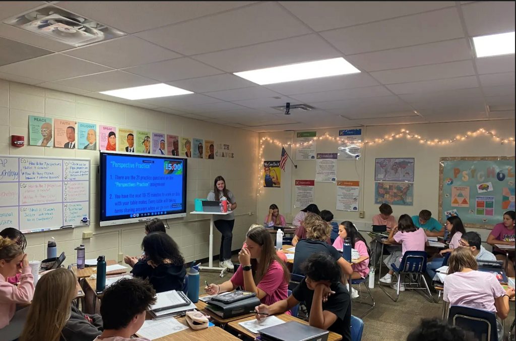 Social Studies teacher Samantha Zak at Waukesha North High School monitors students working together in groups before sharing their answers with classmates. Photo courtesy of the Waukesha School District