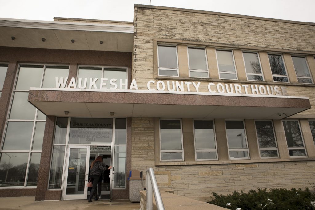 A person enters the Waukesha County Courthouse on Thursday, April 11, 2019. Darin Dubinsky/WPR