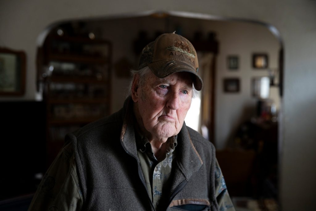 Larry Jones, 85, shown in his home in Milwaukee on March 21, 2025, attended a Wisconsin Assembly hearing with the intention of supporting a bill that would ban gender-affirming care for minors but changed his mind after hearing testimony from trans youth. The moment, captured on video by WisconsinEye, was celebrated by those in attendance and shared widely online. (Joe Timmerman / Wisconsin Watch)