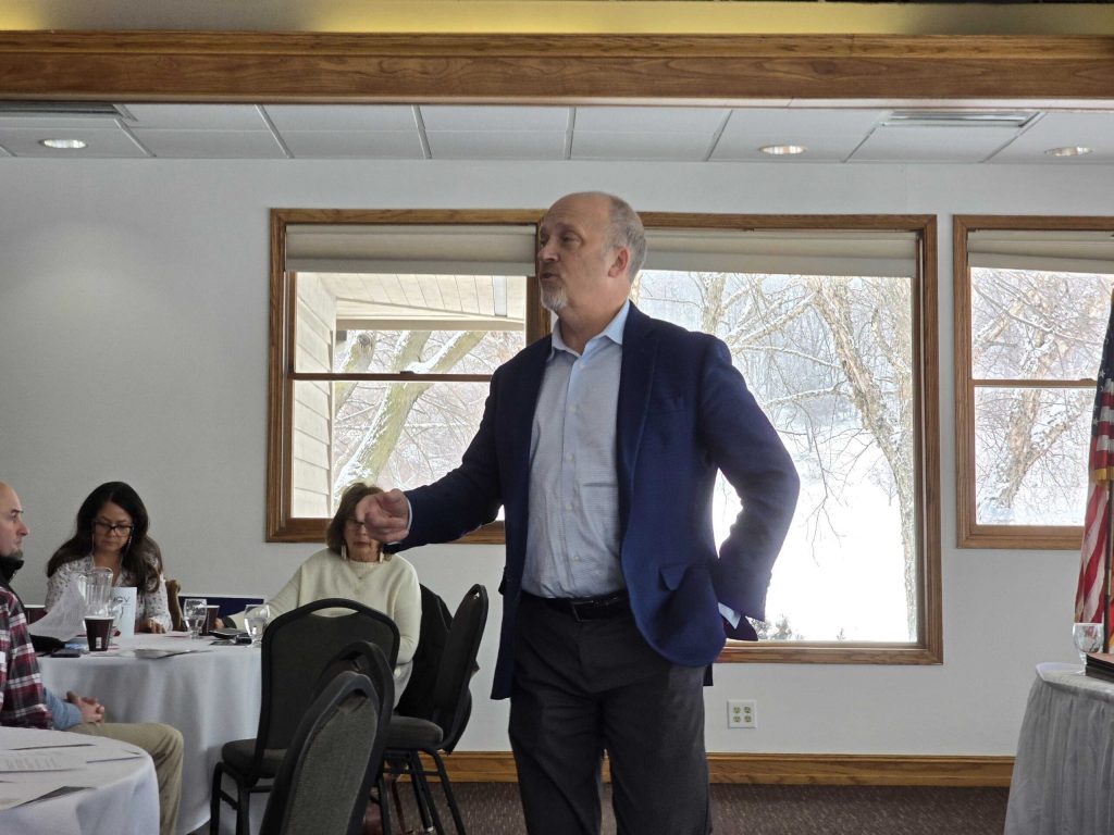 Conservative Wisconsin Supreme Court candidate Brad Schimel addresses a meeting of the La Crosse County Republican caucus. Rich Kremer/WPR