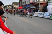 Racers sprint to the finish while the crowd cheers them on at the 2024 Centraal Bay View Classic in the Tour of America's Dairyland. Photo by Jeramey Jannene.