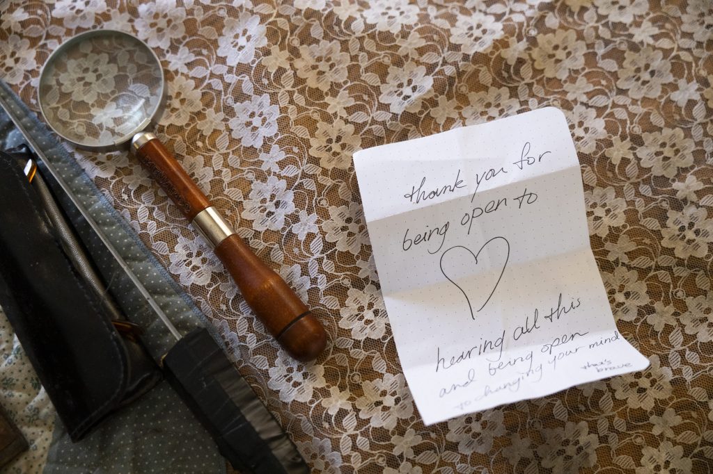 A note given to Larry Jones by a young woman lies on a table in his Milwaukee home on March 21, 2025. As Jones was leaving a Wisconsin Assembly hearing on a bill that would ban gender-affirming care for minors, a woman in her early 20s tapped him on the shoulder and handed him this note that reads, “Thank you for being open to hearing all this and being open to changing your mind. That’s brave.” (Joe Timmerman / Wisconsin Watch)