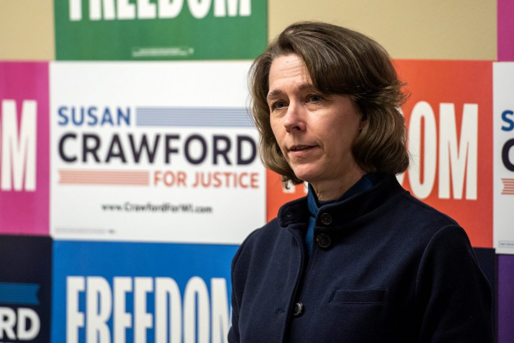 Judge Susan Crawford addresses a crowd at the Rock County Democrats office Sunday, March 2, 2025, in Janesville, Wis. Angela Major/WPR