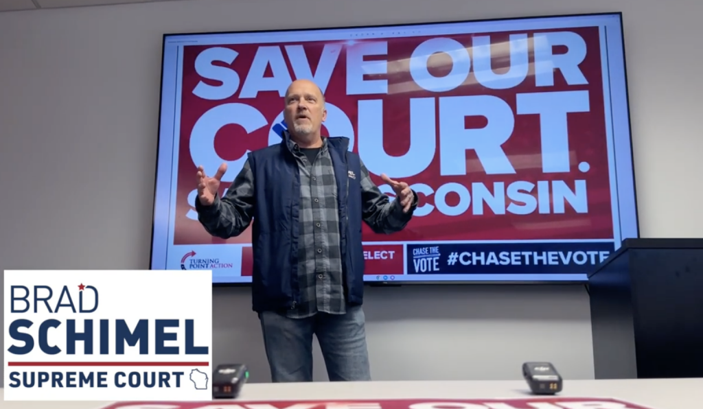 Wisconsin Supreme Court candidate Brad Schimel addresses canvassers at an early March event. (Screenshot)