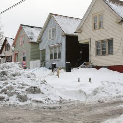 1235 (right), 1239, 1243 S. 26th St.. Photo taken Feb. 10, 2021 by Jeramey Jannene. All Rights Reserved.