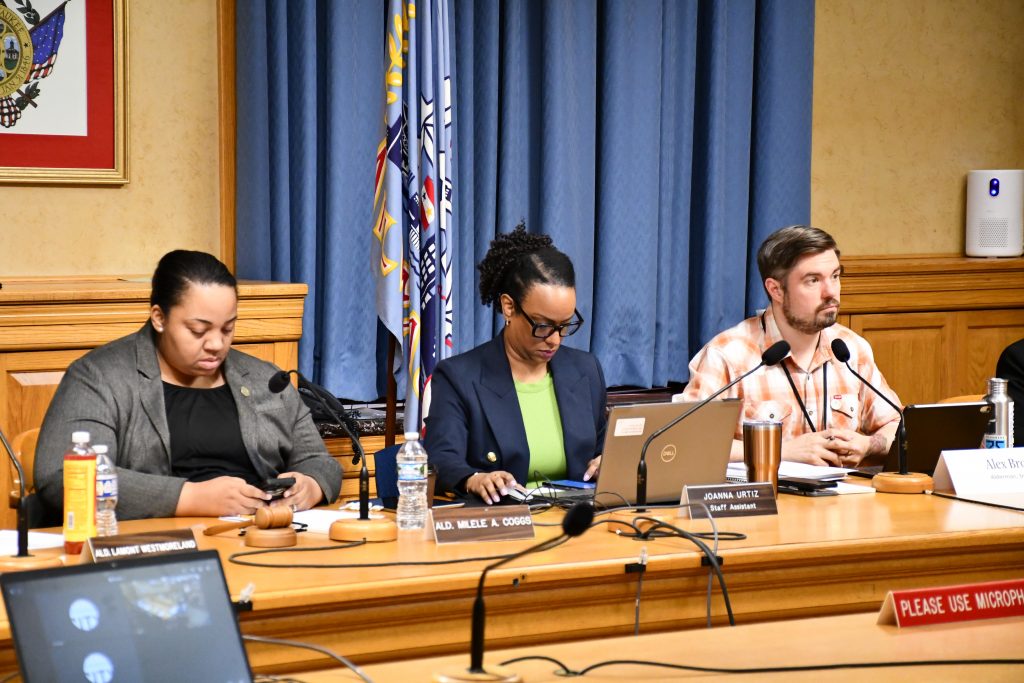 Alex Brower (right) attends his first Common Council committee meeting. Photo by Jeramey Jannene.