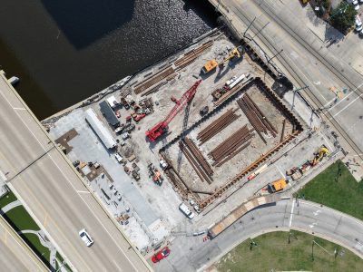 Friday Photos: Dog Park and Foxtown Rise in Freeway’s Shadow