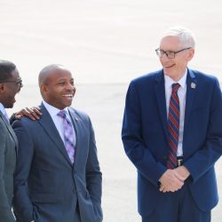 County Executive David Crowley (left), Mayor Cavalier Johnson and Governor Tony Evers await President Joe Biden's arrival. Photo taken March 13, 2024 by Sophie Bolich.