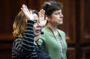 Court interpreters Reme Bashi, left, and Floralba Vivas, right, take an oath, promising to uphold the interpreter code of ethics, before a sentencing hearing in Milwaukee County Circuit Court on Friday, March 21, 2025, in Milwaukee, Wis. Angela Major/WPR