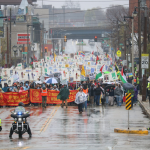 Through The Rain, Thousands March For Immigrant Rights