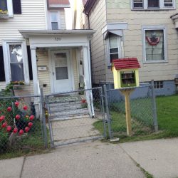 This Little Free Library is located in Walker's Point on W. Scott St. Photo taken August 10th, 2013 by Dave Reid.