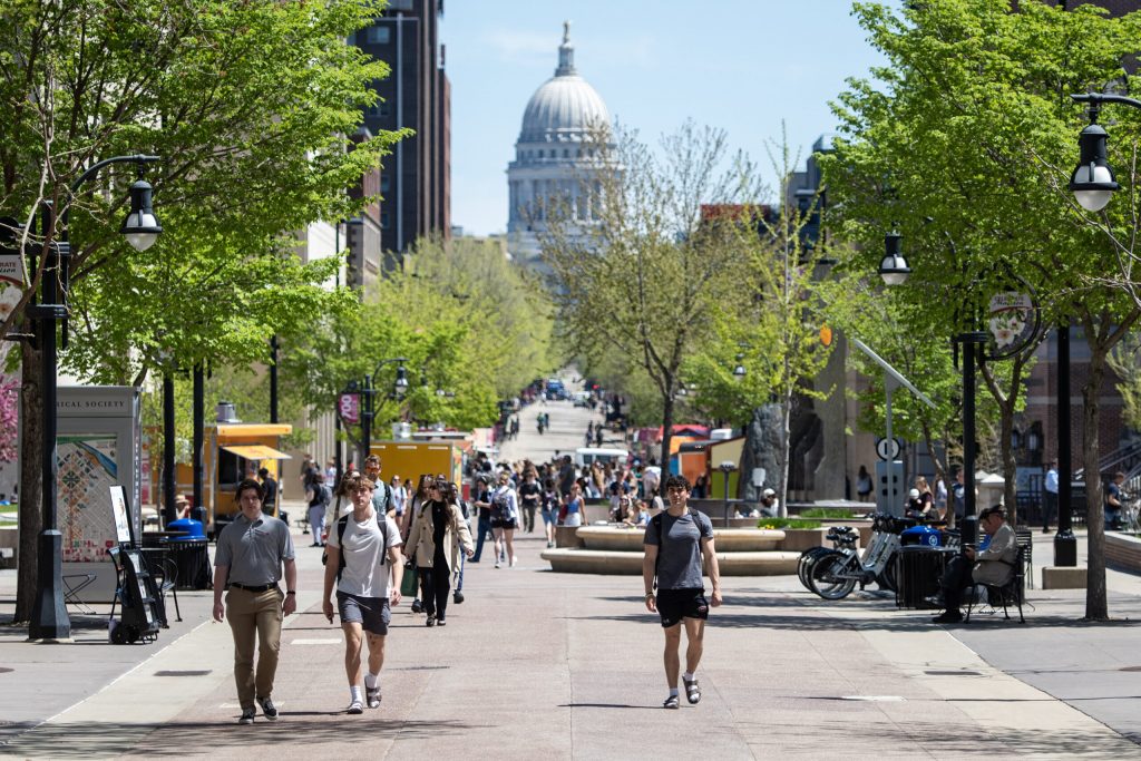 UW-Madison students walk on campus Tuesday, May 6, 2025, in Madison, Wis. Angela Major/WPR