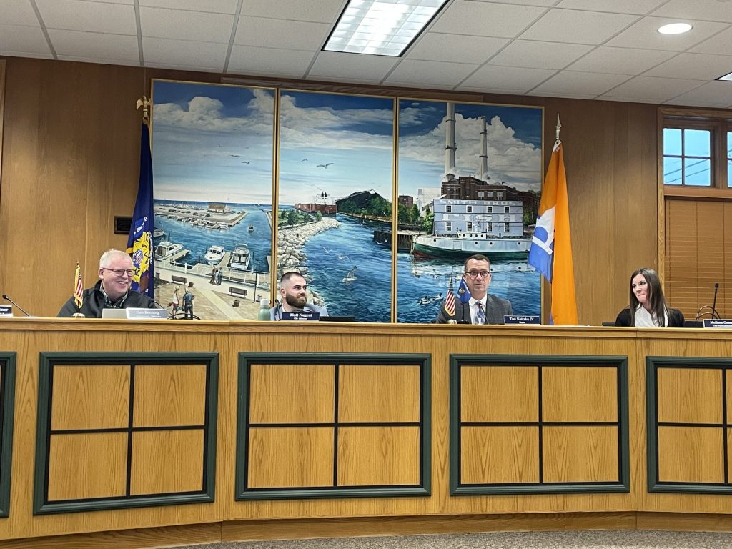 Port Washington alder Dan Benning, city attorney Matt Nugent, mayor Ted Neitzke IV and city administrator Melissa Gossett during the Port Washington Common Council’s May 20, 2025 meeting. Nick Rommel/WPR