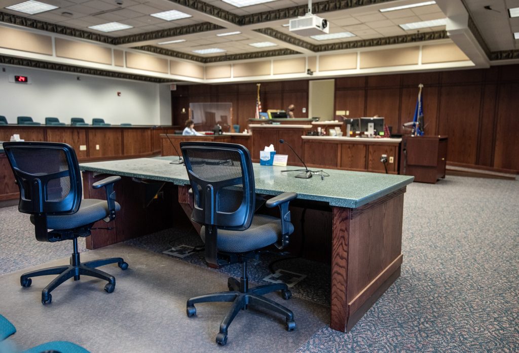 Chairs remain empty before a hearing begins on Wednesday, Feb. 2, 2023, at the Dodge County courthouse in Juneau, Wis. Angela Major/WPR