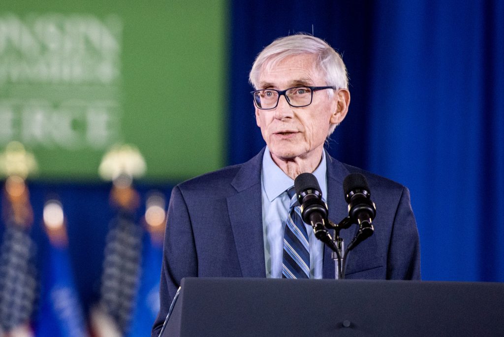 Gov. Tony Evers gives a speech before Pres. Joe Biden’s appearance Wednesday, Dec. 20, 2023, at the Wisconsin Black Chamber of Commerce in Milwaukee, Wis. Angela Major/WPR