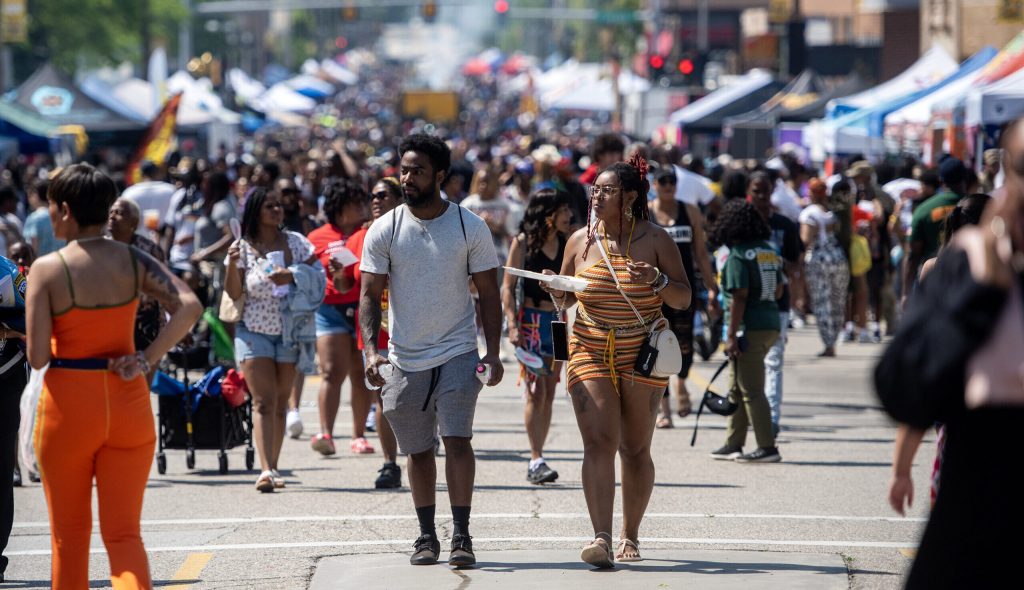 Attendees explore vendors and attractions at the Juneteenth Jubilee Parade on Thursday, June 19, 2025, in Milwaukee, Wis. Angela Major/WPR