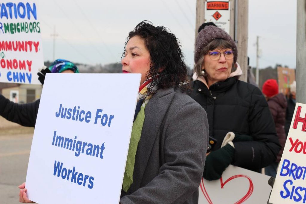 A supporter of Haitian immigrants in New London rallies outside of Tyson Foods on Apr. 9, 2025, in support of the community who recently lost their legal status. Photo courtesy of Forward New London