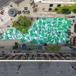 New Mural Brightens East Side Plaza