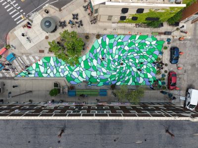 New Mural Brightens East Side Plaza