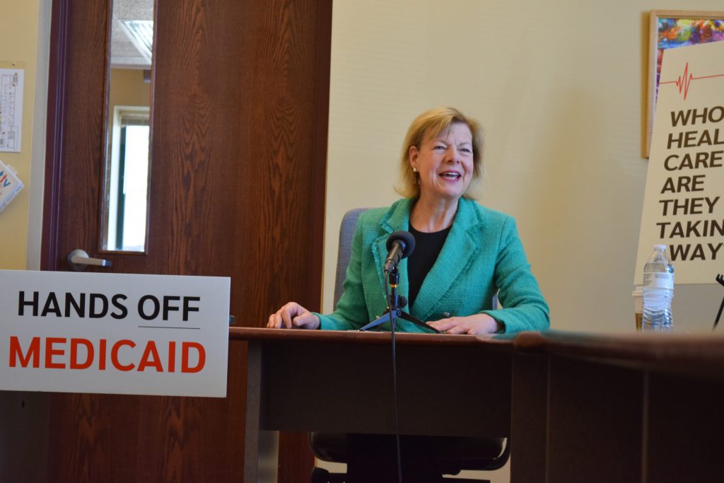 U.S. Sen. Tammy Baldwin, D-Wisconsin, has strongly opposed cuts to Medicaid. She met with Wisconsinites who rely on Medicaid services for themselves or their families during an event in La Crosse on Monday, March 17, 2025. Hope Kirwan/WPR