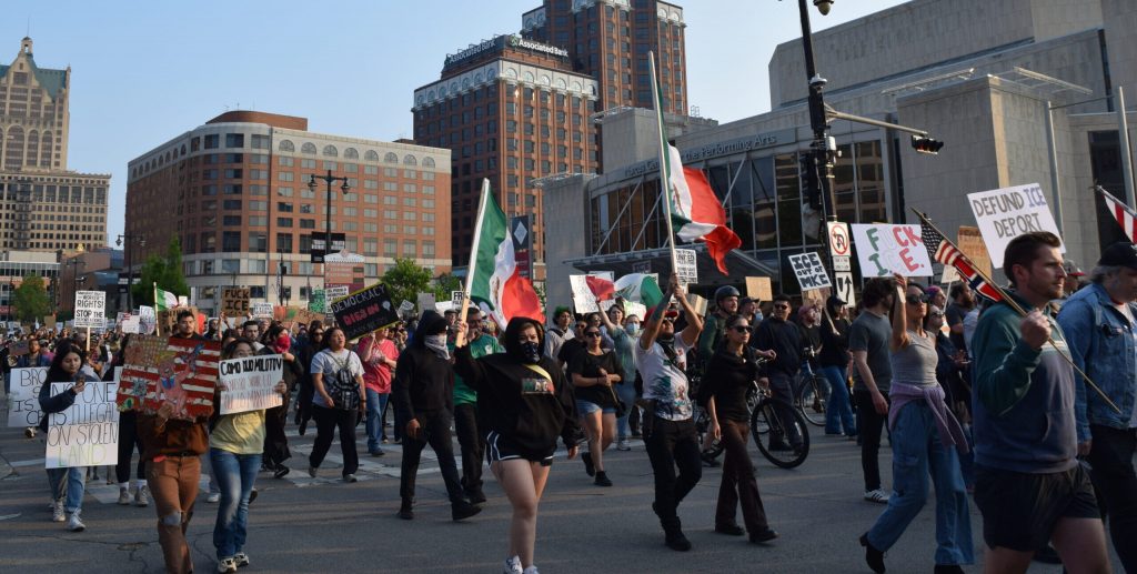Protesters called out recent ICE arrests during a march in Milwaukee on June 10, 2025. Evan Casey/WPR