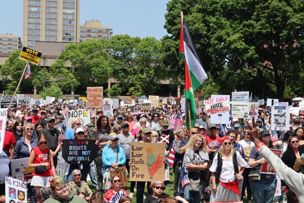 Protesters gather in Milwaukee’s Cathedral Square to march and rally as part of the No Kings Day protests nationwide. (Photo by Isiah Holmes/Wisconsin Examiner)