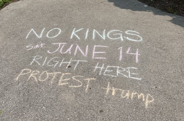 No Kings chalk art at Cathedral Square Park. Photo taken June 13, 2025 by Sophie Bolich.