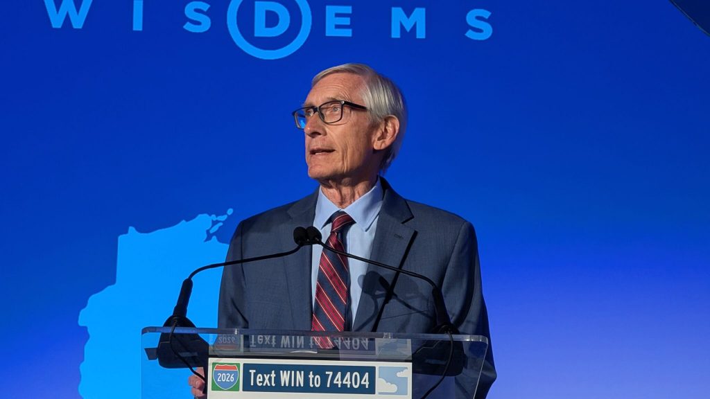 “Everyone stopped calling me two term or three-term Tony, and now they just call me 400-year Tony,” Evers said at the convention. (Photo by Baylor Spears/Wisconsin Examiner) The crowd broke out i