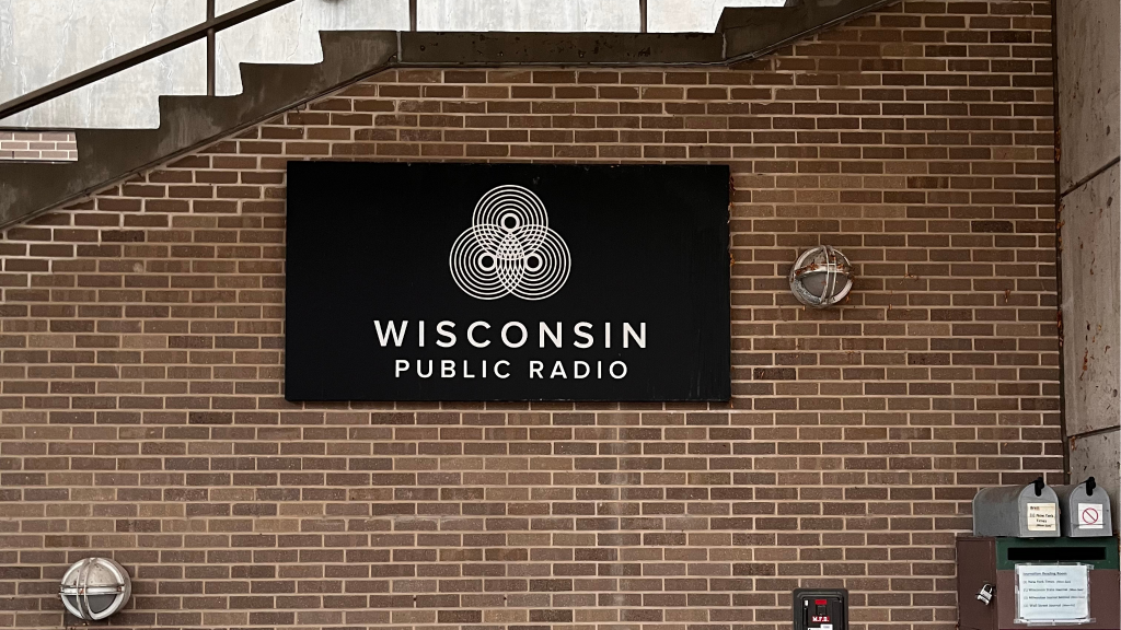 A Wisconsin Public Radio sign hangs outside Vilas Hall on the UW-Madison campus. Anya van Wagtendonk/WPR
