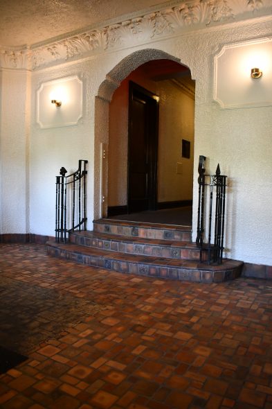The historic Sheridan Apartments has a full lobby with Flandria and deco tiles. Photo by Ben Tyjeski.