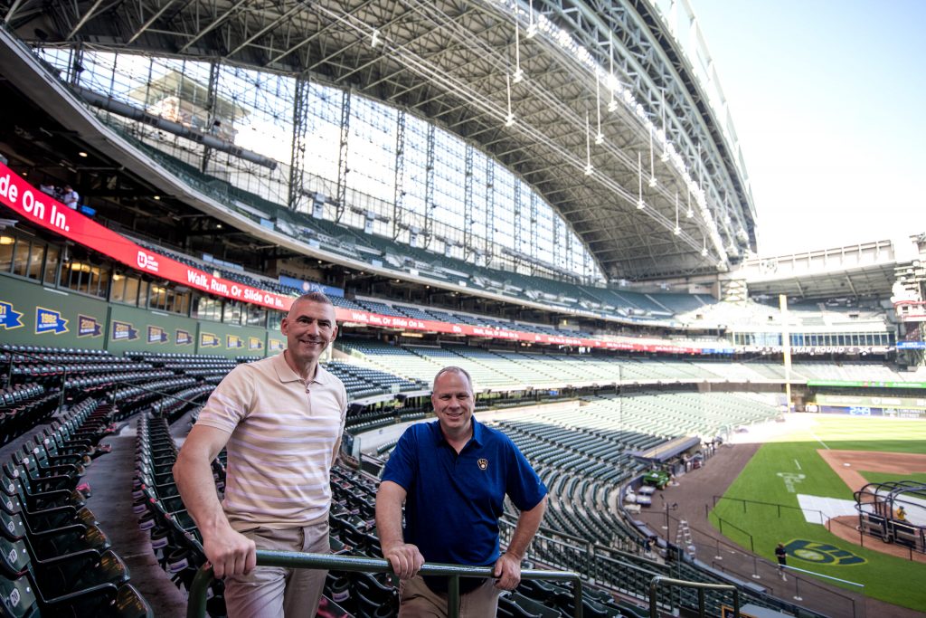 Steve Ethier, senior vice president of stadium operations, left, and Mike Brockman, vice president of facilities and projects, right, on Monday, June 23, 2025, at American Family Field in Milwaukee, Wis. Angela Major/WPR