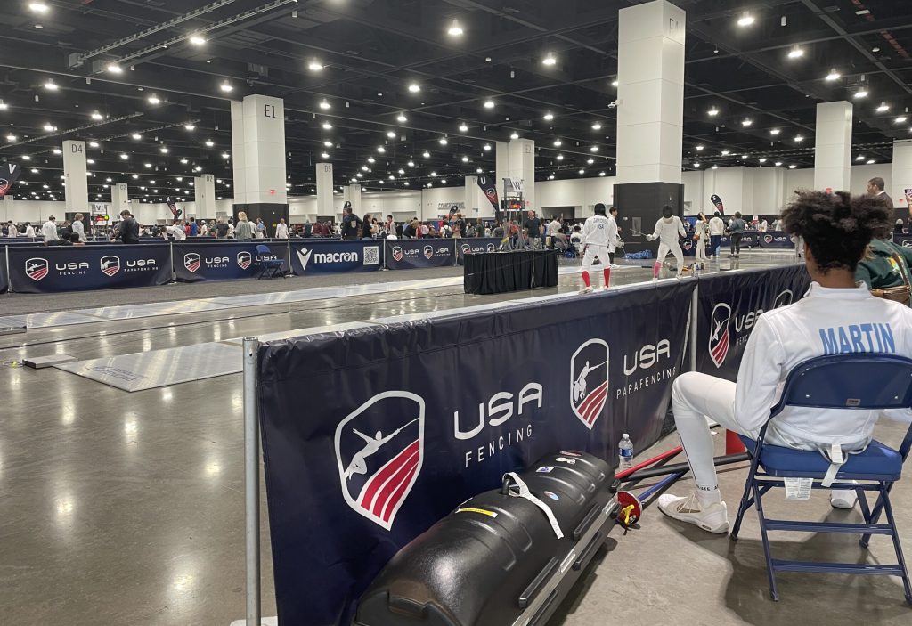 Matches are underway at the USA Fencing National Championship in Milwaukee’s Baird Center on July 2, 2025. Nick Rommel/WPR
