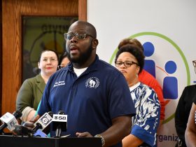 Rep. Supreme Moore Omokunde speaks at Safe & Sound. Photo by Jeramey Jannene.