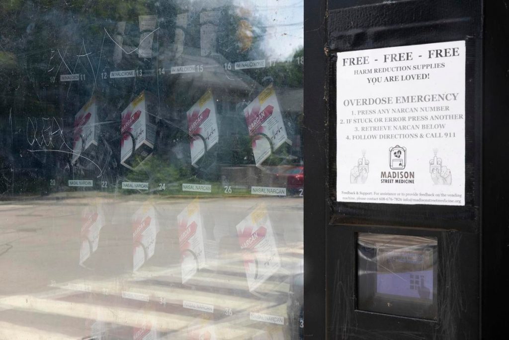Madison Street Medicine's harm reduction vending machine provides Narcan, fentanyl testing strips, condoms and other public health resources for free. It is shown on July 23, 2025, outside the Social Justice Center in Madison, Wis. (Joe Timmerman / Wisconsin Watch)