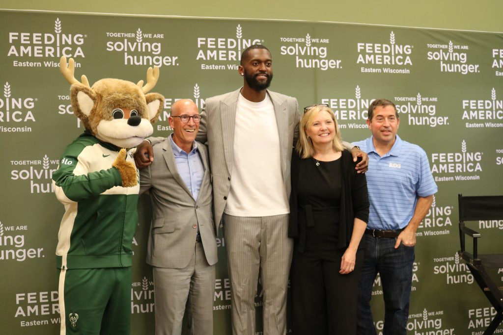 Bango (left), Tom Faughnan, Bobby Portis Jr, Patti Habeck and Peter Feigin at an Aug. 12 press conference. Photo by Sophie Bolich.