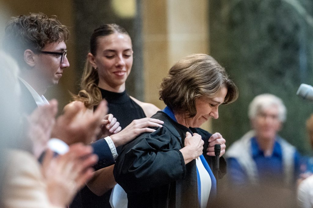 Justice Susan Crawford’s family helps her with her robe during her investiture Friday, Aug. 1, 2025, at the Wisconsin State Capitol in Madison, Wis. Angela Major/WPR