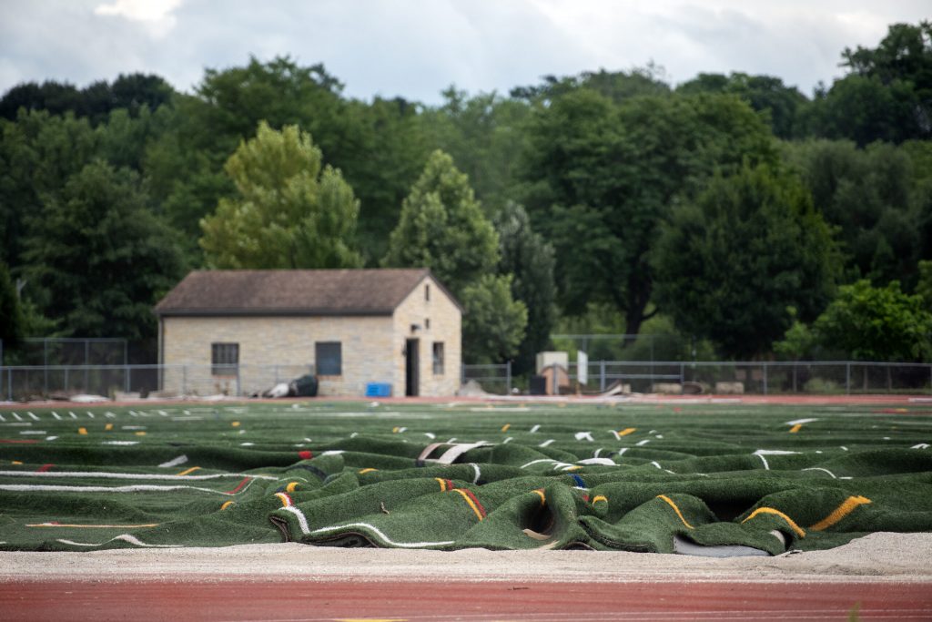A football field at Hart Park is damaged following a storm Tuesday, Aug. 12, 2025, in Wauwatosa, Wis. Angela Major/WPR