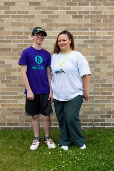 Tasha H. is shown with her son during Camp Reunite at Taycheedah Correctional Institution. Before camp, Tasha had not seen her son in the year since she was arrested. (Joe Timmerman / Wisconsin Watch)