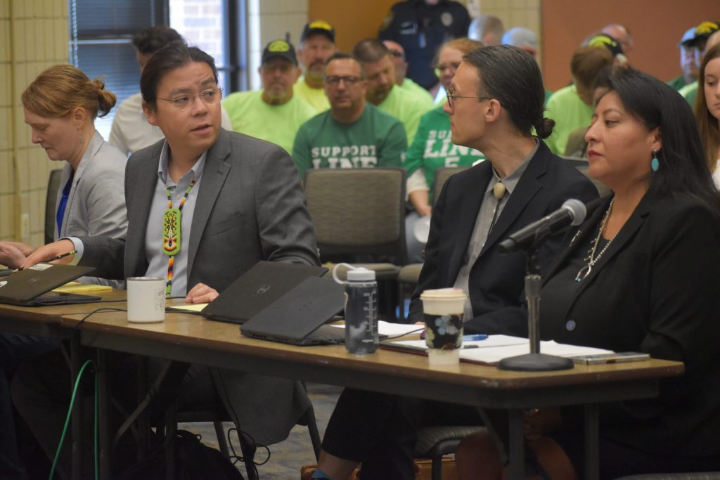 Attorneys for the Bad River tribe present their case as part of a challenge to key permits for Enbridge’s Line 5 relocation project at a hearing in Ashland on Aug. 12, 2025. Danielle Kaeding/WPR
