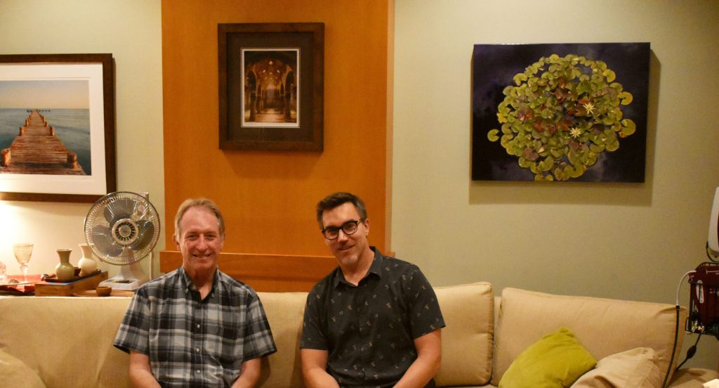 UW-Madison professors Charles Raison and Christopher Nicholas run clinical trials probing the therapeutic potential of psychedelics and study how the drugs work in the brain. They’re pictured on July 28, 2025, in the room they host trial participants. Anna Marie Yanny/WPR
