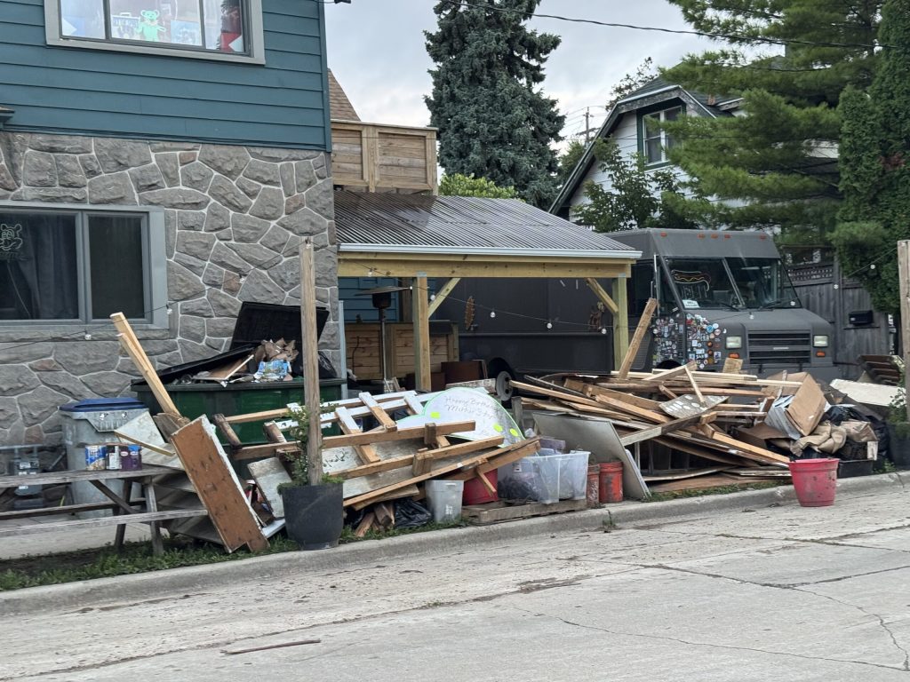 Damage left behind by flooding is seen here at The Mothership, a bar in Milwaukee’s Bay View neighborhood. Evan Casey/WPR