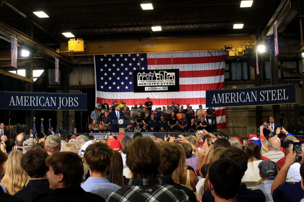 Vice President JD Vance addresses a crowd at Mid-City Steel in La Crosse on Thursday. Photo by Henry Redman, Wisconsin Examiner.