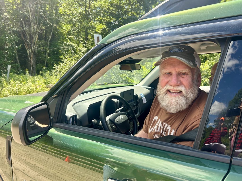 While out for a drive, Medford resident Jim Shaw stopped to talk to mining company officials near the site of its drilling activities in the Chequamegon-Nicolet National Forest on July 17, 2025. Danielle Kaeding/WPR