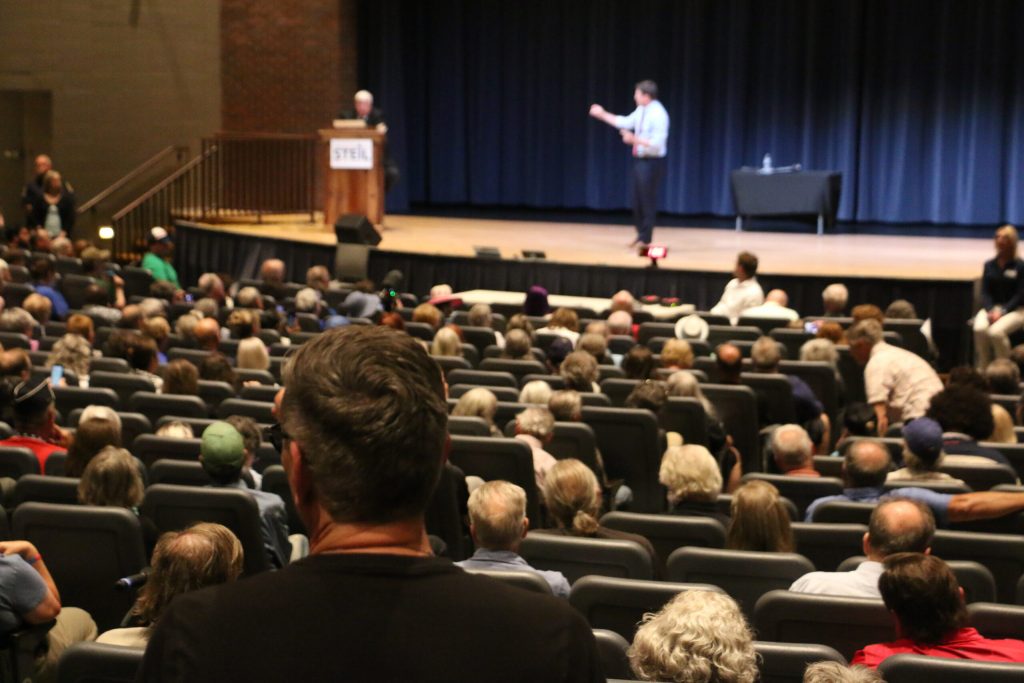 A crowd of people gathered in Elkhorn, Wis. to hear from Republican U.S. Rep. Bryan Steil on Thursday, July 31, 2025. Steil was repeatedly booed at the forum, his first since President Donald Trump signed his sweeping budget and immigration law. Rich Kremer/WPR