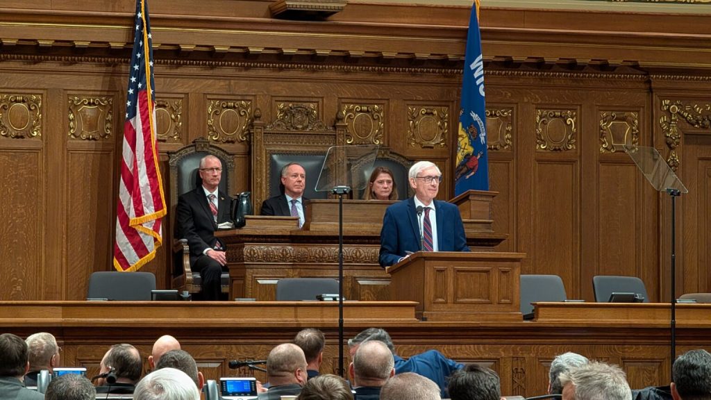 Gov. Tony Evers delivers his 2025 state budget address in February. The bipartisan budget Evers signed in July spends down much of Wisconsin's budget surplus. (Photo by Baylor Spears/Wisconsin Examiner)