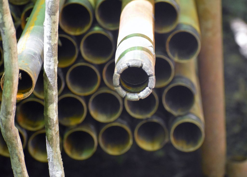 A diamond-core drill bit is used to bore through glacial material and bedrock as Green Light Wisconsin explores the Bend deposit for copper and gold. Danielle Kaeding/WPR