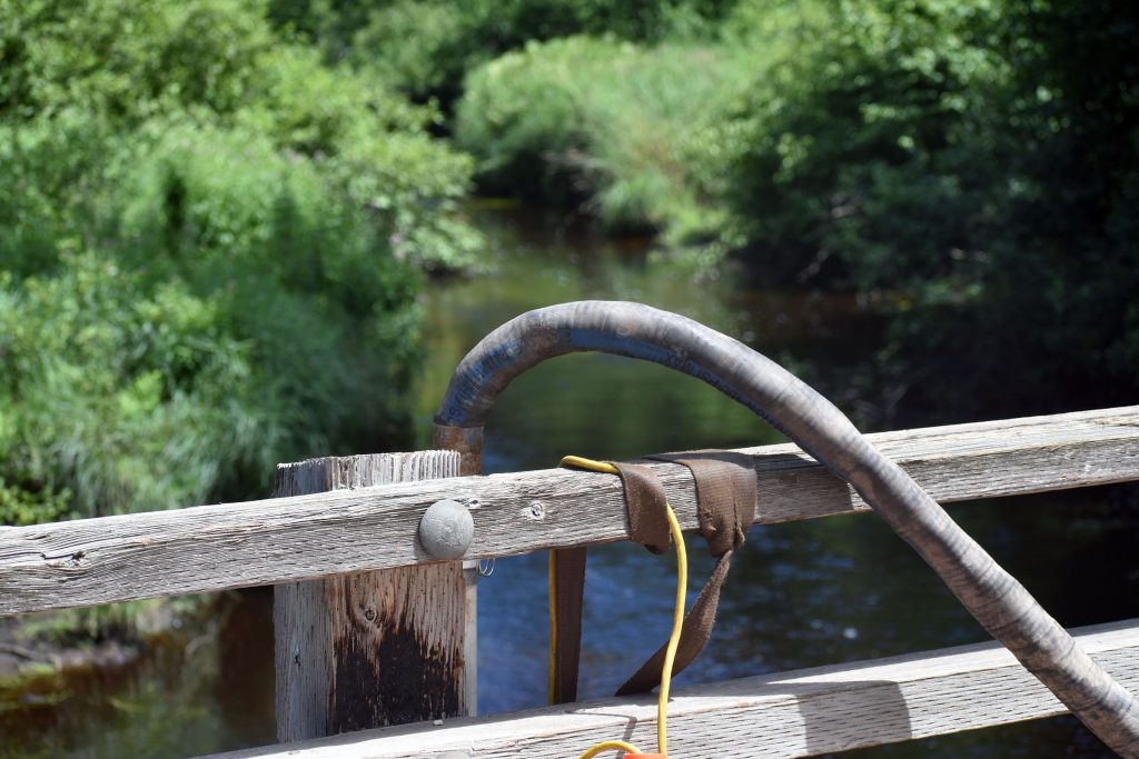 The drilling contractor for Green Light Wisconsin has been pumping around 1,500 gallons daily as part of drilling operations at the Bend deposit in the Chequamegon-Nicolet National Forest near Medford. Danielle Kaeding/WPR