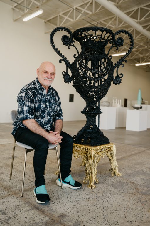Joel Otterson with his sculpture Voluptuous Desire. © 2025 Sculpture Milwaukee. All rights reserved. Photograph by Michael Lagerman.